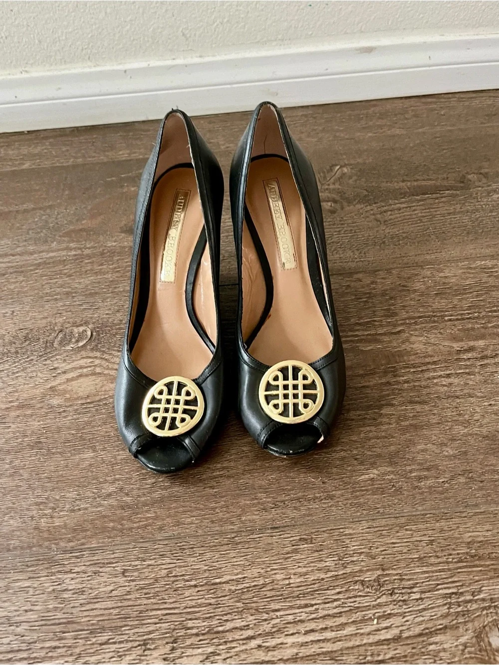 Audrey Brooke Black Wedge Peep-Toe Pumps with Gold Medallion
